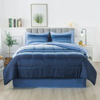 Alapok az ombre kék ágyban egy táskában ágyneműben